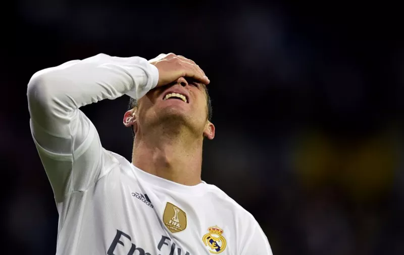 TOPSHOTS
Real Madrid's Portuguese forward Cristiano Ronaldo gestures during the Spanish league "Clasico" football match Real Madrid CF vs FC Barcelona at the Santiago Bernabeu stadium in Madrid on November 21, 2015. AFP PHOTO/ JAVIER SORIANO / AFP / JAVIER SORIANO