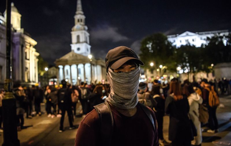 Demonstrators assembled in Trafalgar Square to take part in an emergency action protesting the new anti mask law passed  today by the Hong Kong administration banning the covering of faces in all public gatherings.
Hong Kong solidarity rally, London, UK - 04 Oct 2019, Image: 475223320, License: Rights-managed, Restrictions: , Model Release: no, Credit line: Guilhem Baker/LNP / Shutterstock Editorial / Profimedia