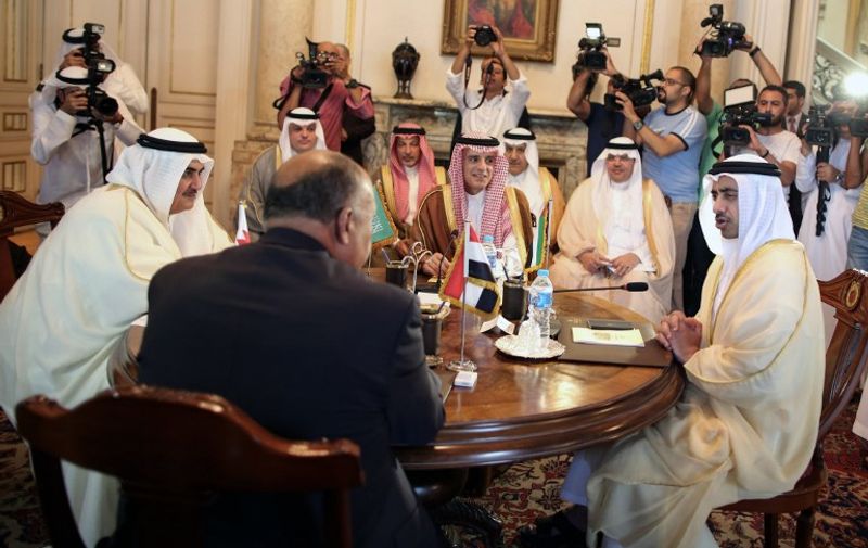 Bahraini Foreign Minister Khalid bin Ahmed al-Khalifa (L), Egyptian Foreign Minister Sameh Shoukry (C-L), Saudi Foreign Minister Adel al-Jubeir (C-R), and UAE Minister of Foreign Affairs and International Cooperation Abdullah bin Zayed Al-Nahyan (R) meet in the Egyptian capital Cairo on July 5, 2017, to discuss the Gulf diplomatic crisis with Qatar, as Doha called for dialogue to resolve the dispute.
The Saudi foreign ministry said on July 5, 2017 that it had received Qatar's response to a 13-point list of demands issued on June 22 -- which include Doha ending support for the Muslim Brotherhood and closing broadcaster Al-Jazeera -- and would respond "at the right time". / AFP PHOTO / POOL / Khaled ELFIQI