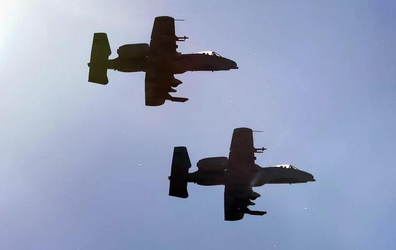 US Air Force A-10 Thunderbolt attack aircrafts fly over the Osan Air Base in Pyeongtaek on November 4, 2022, as South Korea and US agreed to extend a joint aerial drill called "Vigilant Storm". (Photo by YONHAP / AFP) / - South Korea OUT / REPUBLIC OF KOREA OUT  NO ARCHIVES  RESTRICTED TO SUBSCRIPTION USE