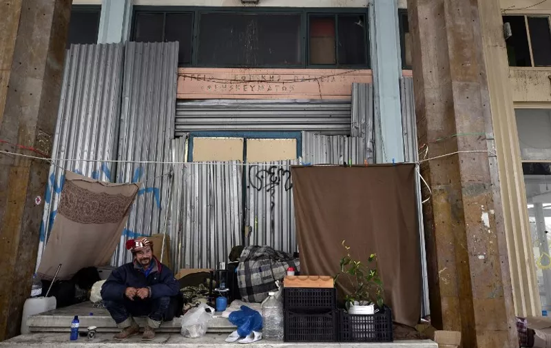 A homeless man sits at the entrance of the former Ministry of Education and Religions, now abandoned, where he found a temporary shelter in the center of Athens on March 27, 2015. Bundesbank chief Jens Weidmann says he is opposed to giving Greece more emergency loans, charging the new government in Athens with frittering away [&hellip;]