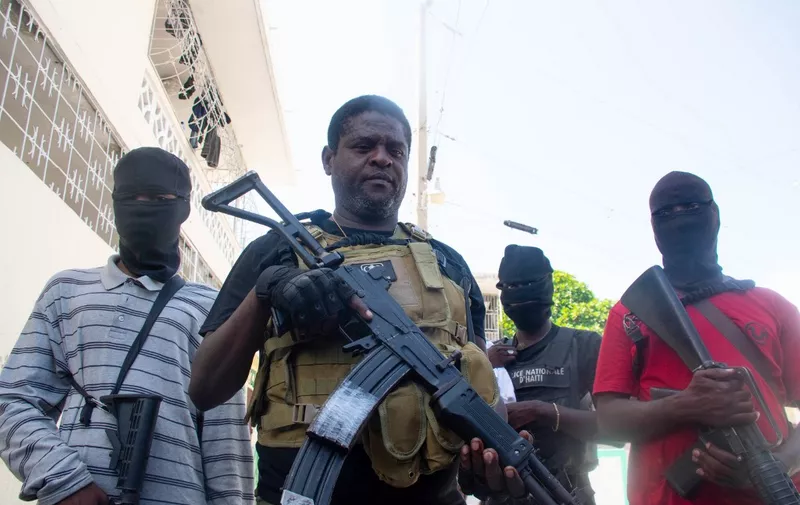 Armed gang leader Jimmy "Barbecue" Cherizier and his men are seen in Port-au-Prince, Haiti, March 5,2024. Haiti's police academy came under attack by an armed gang on March 5, as the tiny Caribbean nation fell into deeper isolation in the wake of an assault on the airport and a deadly prison breakout.
The attack on the academy, where more than 800 cadets are training, was repelled after the arrival of reinforcements, said Lionel Lazarre of the Haitian police union.
The gangs say they want to overthrow the disputed prime minister, Ariel Henry, who was out of the country at the weekend for a trip to Kenya to push for the deployment of a UN-backed multinational police mission to try to stabilize Haiti. (Photo by Clarens SIFFROY / AFP)