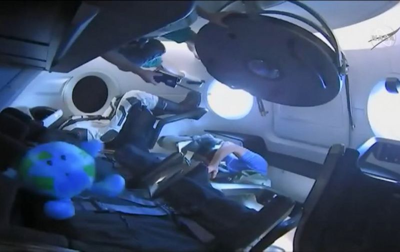 This video grab taken from the Space X webcast transmission on March 3, 2019, shows a dummy named Ripley onboard a SpaceX Falcon 9 rocket with the company's Crew Dragon spacecraft onboard after the opening of the hatch during the Demo-1 mission. (Photo by HO / SPACEX / AFP) / RESTRICTED TO EDITORIAL USE - MANDATORY CREDIT "AFP PHOTO / SPACEX" - NO MARKETING NO ADVERTISING CAMPAIGNS - DISTRIBUTED AS A SERVICE TO CLIENTS ---