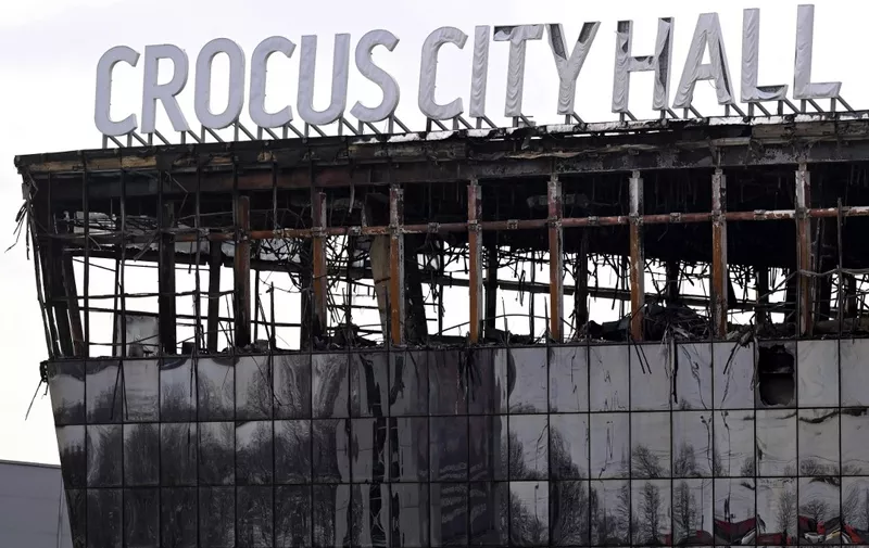 A view shows the burnt-out Crocus City Hall concert venue in Krasnogorsk, outside Moscow, on March 26, 2024. At least 139 people were killed when gunmen in camouflage stormed Crocus City Hall, shooting spectators before setting the building on fire in the most fatal attack in Europe to have been claimed by Islamic State jihadists. (Photo by NATALIA KOLESNIKOVA / AFP)