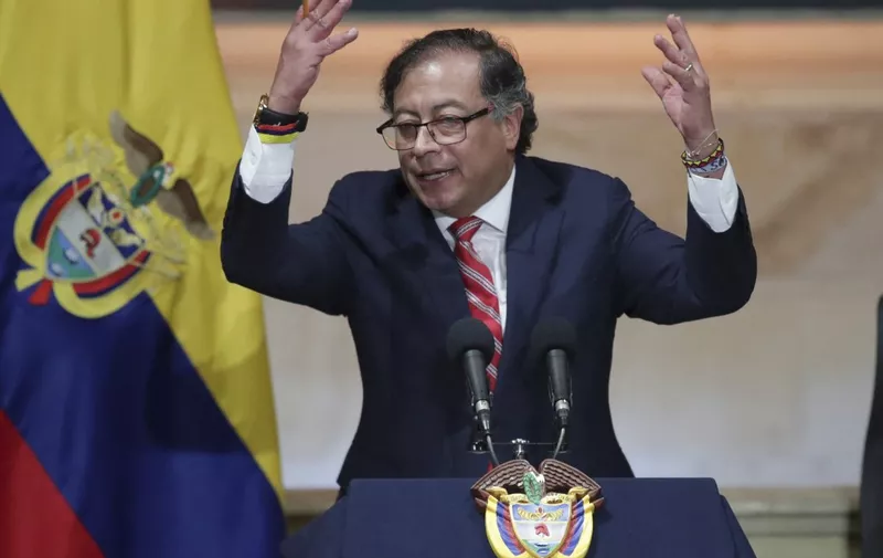 (FILES) Colombian President Gustavo Petro delivers a speech during the installation of the ordinary sessions of the Congress in Bogota on July 20, 2023. Colombia's President Gustavo Petro on Monday compared Israel's targeting of Gaza in retaliation for deadly attacks by militant group Hamas to the Nazi persecution of Jews. Israel has pounded the Gaza Strip over the past three days after Hamas militants surged into southern Israeli towns in a surprise attack that has left hundreds dead. Dozens were taken hostage -- two of them believed to be Colombians. (Photo by Juan Pablo Pino / AFP)