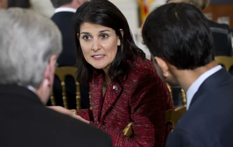 South Carolina Governor Nikki Haley awaits a speech by US President Barack Obama during the National Governors Association meeting in the State Dining Room of the White House in Washington, DC, February 27, 2012. AFP PHOTO / Saul LOEB / AFP PHOTO / SAUL LOEB