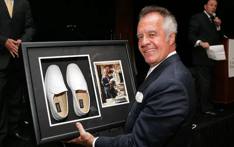 NEW YORK - JUNE 14:  Actor Tony Sirico holds the shoes he wore on the television show "The Sopranos", which are up for auction at the St. Jude's Children's Research Hospital Benefit at Pier 60 June 14, 2007 in New York City.  (Photo by Bryan Bedder/Getty Images) *** Local Caption *** Tony Sirico (Photo by Bryan Bedder / Getty Images North America / Getty Images via AFP)