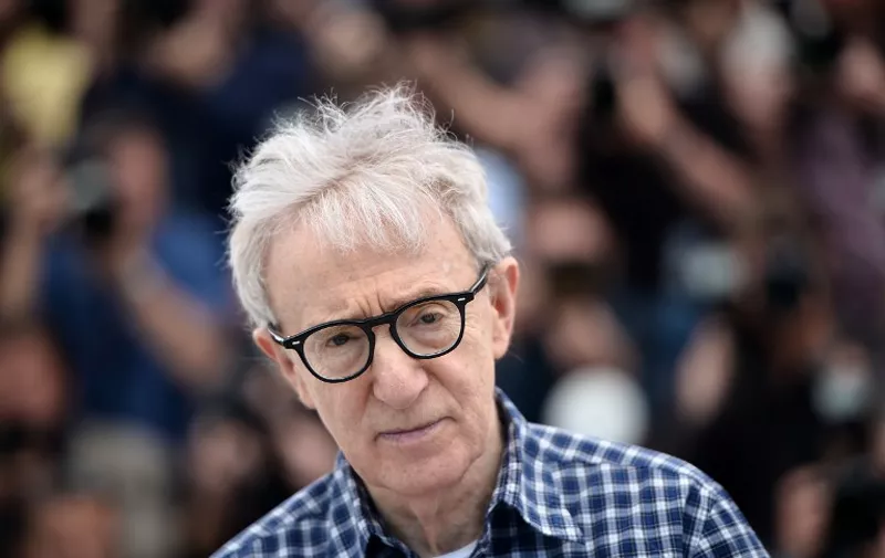 (FILES) This file photo taken on May 15, 2015 shows US director Woody Allen posing for photographs during a photocall for the film "Irrational Man" at the 68th Cannes Film Festival in Cannes, southeastern France, on May 15, 2015.  
Woody Allen's Hollywood love story "Cafe Society" will open the Cannes film festival in May, its organisers said on March 29, 2013. The movie starring Kristen Stewart and Jesse Eisenberg tells the story of a young man who goes to Los Angeles in the 1930s in the hope of working in the film industry.
 / AFP / BERTRAND LANGLOIS