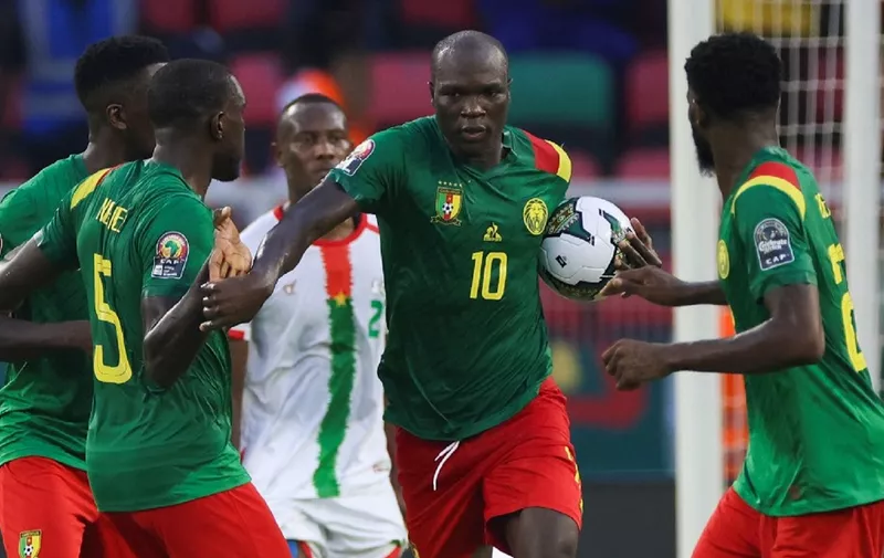 Cameroon's forward Vincent Aboubakar (2nd R) celebrates scoring his team's first goal during the Group A Africa Cup of Nations (CAN) 2021 football match between Cameroon and Burkina Faso at Stade d'Olembé in Yaounde on January 9, 2022. (Photo by Kenzo Tribouillard / AFP)