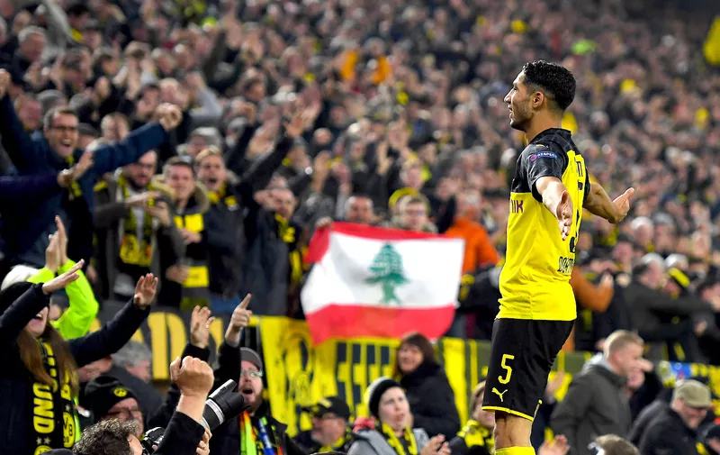 DORTMUND, GERMANY - NOVEMBER 05: Achraf Hakimi of Borussia Dortmund celebrates after scoring his team's third goal during the UEFA Champions League group F match between Borussia Dortmund and Inter at Signal Iduna Park on November 05, 2019 in Dortmund, Germany. (Photo by J√∂rg Sch√ºler/Getty Images)
