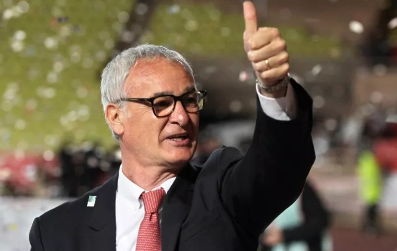 Monaco's Italian coach Claudio Ranieri acknowledges applause from Monaco's supporters following the French L1 football match Monaco (ASM) vs Bordeaux (FCGB) on May 17, 2014 at the Louis-II Stadium in Monaco. AFP PHOTO / JEAN CHRISTOPHE MAGNENET