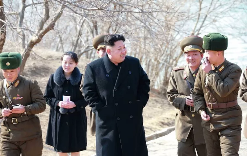 This undated picture released from North Korea's official Korean Central News Agency (KCNA) on March 12, 2015 shows North Korean leader Kim Jong-Un (C) inspecting the Sin Islet defence company in Kangwon province, while Kim Yo-Jong (2nd L), vice department director of the Central Committee of the Worker's Party of Korea (WPK) and the younger sister of Kim Jong-Un, follows him.   AFP PHOTO / KCNA via KNS    REPUBLIC OF KOREA OUT
THIS PICTURE WAS MADE AVAILABLE BY A THIRD PARTY. AFP CAN NOT INDEPENDENTLY VERIFY THE AUTHENTICITY, LOCATION, DATE AND CONTENT OF THIS IMAGE. THIS PHOTO IS DISTRIBUTED EXACTLY AS RECEIVED BY AFP.
---EDITORS NOTE--- RESTRICTED TO EDITORIAL USE - MANDATORY CREDIT "AFP PHOTO / KCNA VIA KNS" - NO MARKETING NO ADVERTISING CAMPAIGNS - DISTRIBUTED AS A SERVICE TO CLIENTS / AFP PHOTO / KCNA / KNS