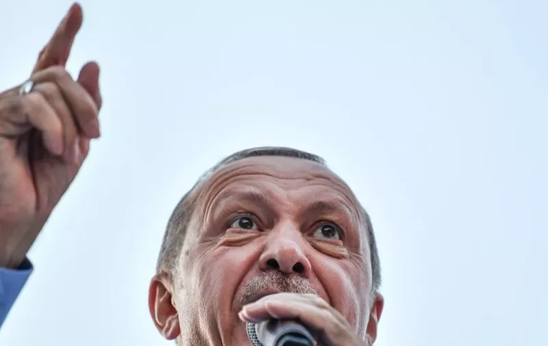 President of Turkey and the leader of the Justice and Development Party (AK Party) Recep Tayyip Erdogan speaks during a rally at the Gaziosmanpasa district of Istanbul, on June 22, 2018. 
Turkey will go to the polls in parliamentary and presidential elections on June 24.  / AFP PHOTO / BULENT KILIC
