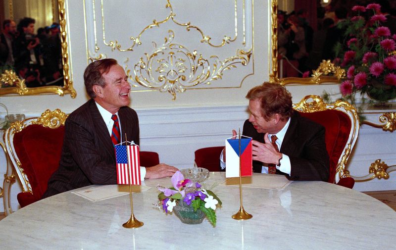 President George Bush and Czechoslovak President Vaclav Havel, right, sit together at a table in the Prague Castle, Nov. 17, 1990, as they start their talks. President Bush arrived earlier in the day for talks with the government and to attend festivities of the first anniversary of the Czech revolution. (AP Photo/J. Scott Applewhite)