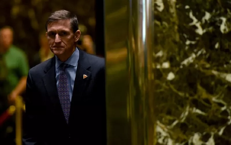 (FILES) This file photo taken on December 12, 2016 shows Lt. Gen. Michael Flynn arriving for a meeting with US President-elect Donald Trump at Trump Tower in New York.
The White House announced February 13, 2017 that Michael Flynn has resigned as President Donald Trump's national security advisor, amid escalating controversy over his contacts with Moscow. In his formal resignation letter, Flynn acknowledged that in the period leading up to Trump's inauguration: "I inadvertently briefed the vice president-elect and others with incomplete information regarding my phone calls with the Russian ambassador." / AFP PHOTO / TIMOTHY A. CLARY