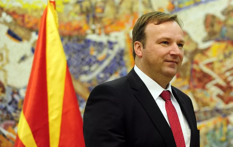 The new Macedonian interim Prime Minister Emil Dimitriev looks on after receiving a mandate to form a new government from the Macedonian president at the presidential office on January 18, 2016 in Skopje, after Macedonian lawmakers voted to dissolve parliament next month ahead of an early election in April 24, in line with an EU-backed deal to end a political crisis but without the agreement of the main opposition.
The parliament of the Balkan country voted to dissolve itself on February 24, after noting the resignation of Prime Minister Nikola Gruevski, who was required to step down 100 days ahead of a vote in accordance with the deal. The agreement reached in July last year between the government and the opposition was designed to end months of turmoil in the country of about 2.1 million people. / AFP / Robert ATANASOVSKI