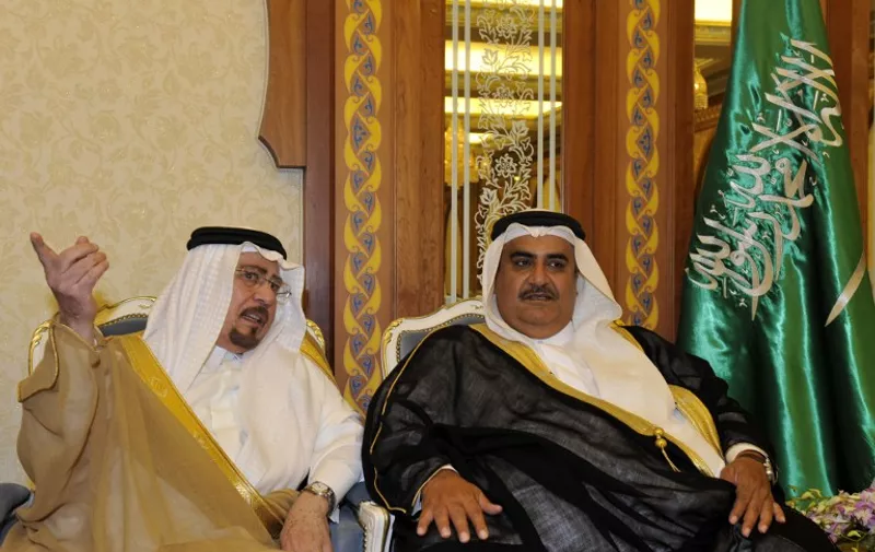 Bahrain's Foreign Minister Sheikh Khaled bin Ahmad al-Khalifa (R) listens to Saudi Minister of Sate  for Foreign Affairs Nizar Bin Obaid Madani prior to the start of the meeting of the Gulf Cooperation Council's (GCC) in the Saudi coastal city of Jeddah on September 06, 2010. 