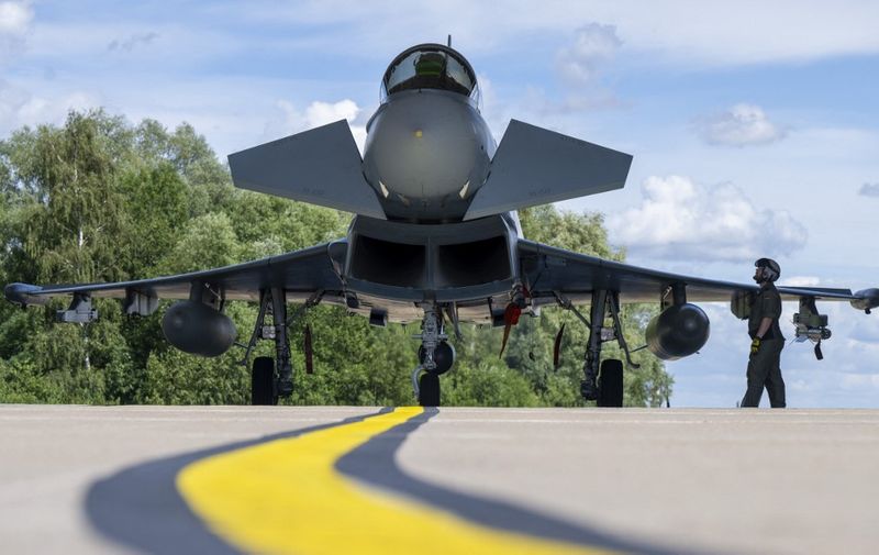 11 July 2022, Mecklemburg-Western Pomerania, Laage: A Eurofighter Typhoon fighter aircraft stands after landing at Rostock-Laage Airport, taken on the occasion of U.S. General Brown's visit to Tactical Air Squadron 73 "Steinhoff." Photo: Monika Skolimowska/dpa (Photo by Monika Skolimowska / DPA / dpa Picture-Alliance via AFP)