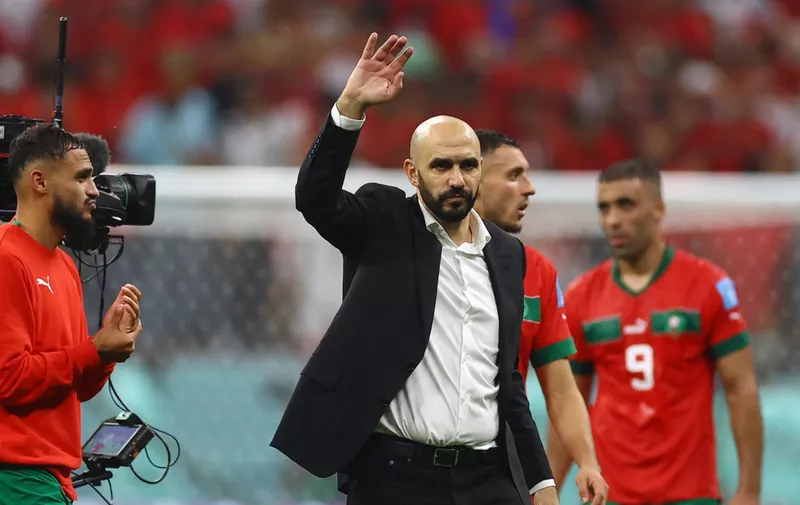 Soccer Football - FIFA World Cup Qatar 2022 - Semi Final - France v Morocco - Al Bayt Stadium, Al Khor, Qatar - December 14, 2022 Morocco coach Walid Regragui acknowledges the fans after the match as Morocco are eliminated from the World Cup REUTERS/Kai Pfaffenbach