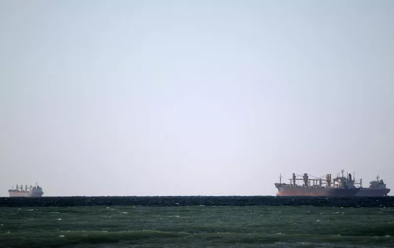Oil tankers cruise out the Strait of Hormuz off the shores of Tibat in Oman on January 15, 2012 Iran threatened to close the Strait of Hormuz in the Gulf if extra sanctions bite, cutting off the transport of 20 percent of the world's oil as United States warned that Iran would cross a "red line," prompting likely military action. AFP PHOTO/MARWAN NAAMANI (Photo by MARWAN NAAMANI / AFP)