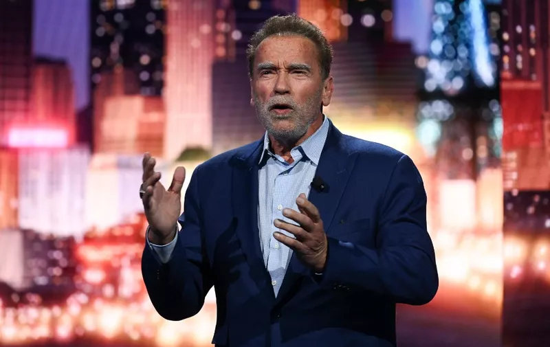 US-Austrian actor and Former Governor of California Arnold Schwarzenegger speaks about clean energy during the Consumer Electronics Show (CES) on January 4, 2023 in Las Vegas, Nevada. (Photo by Patrick T. Fallon / AFP)