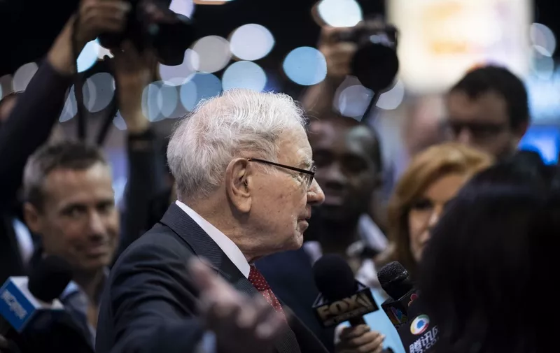 Warren Buffett, CEO of Berkshire Hathaway, speaks to the press as he arrives at the 2019 annual shareholders meeting in Omaha, Nebraska, May 4, 2019. (Photo by Johannes EISELE / AFP)