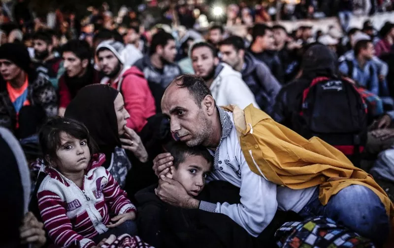 -- AFP PICTURES OF THE YEAR 2015 --
Migrants and refugees wait at Istanbul's Esenler Bus Terminal for buses to the Turkish-Greek border after authorities withheld tickets to Turkish border towns on September 16, 2015. Hundreds of refugees camped out at the main bus station in Istanbul for a second night running after being refused tickets for Edirne, some 250 kilometres (150 miles) away. Many of the refugees seeking to leave Turkey have been living in the country for months, sometimes years, after fleeing the bloody civil war in neighbouring Syria. AFP PHOTO / YASIN AKGUL / AFP / YASIN AKGUL