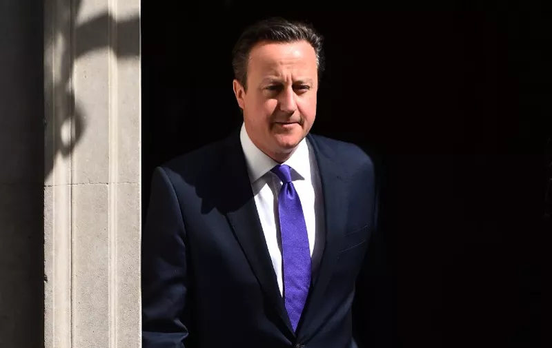 British Prime Minister David Cameron leaves 10 Downing Street in central London on May 11, 2015. Conservative Prime Minister David Cameron continued to appoint members of the government after a shock election victory in the May 7 general election.  AFP PHOTO / BEN STANSALL