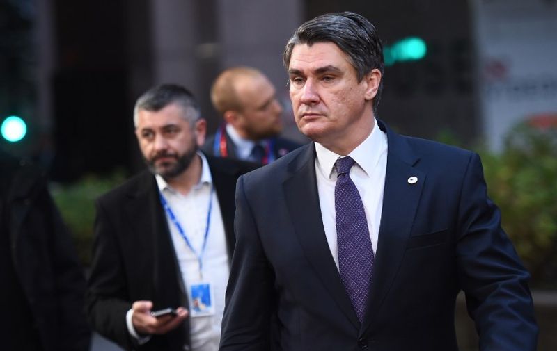 Croatia's Prime minister Zoran Milanovic arrives at the European Council in Brussels to take part in the final European Union (EU) summit of the year on December 17, 2015. EU leaders will discuss British Prime Minister David Cameron's controversial reform demands as well as plans for a new European border force to deal with the migration crisis.  AFP PHOTO / EMMANUEL DUNAND / AFP / EMMANUEL DUNAND