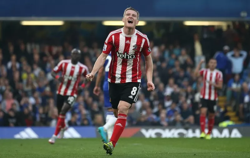 Southampton's Northern Irish midfielder Steven Davis celebrates scoring their first goal during the English Premier League football match between Chelsea and Southampton at Stamford Bridge in London on October 3, 2015. AFP PHOTO / JUSTIN TALLIS

RESTRICTED TO EDITORIAL USE. No use with unauthorized audio, video, data, fixture lists, club/league logos or 'live' services. Online in-match use limited to 75 images, no video emulation. No use in betting, games or single club/league/player publications.