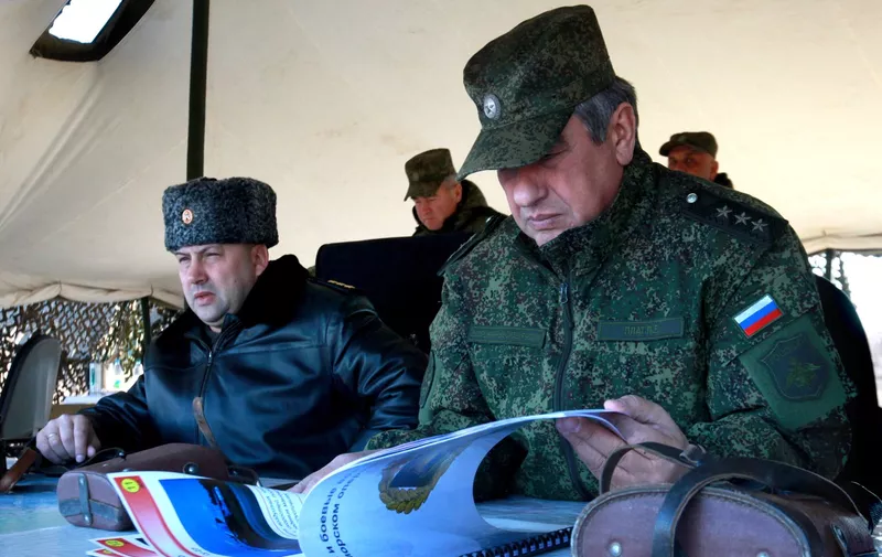 2519472 10/29/2014 Russian Deputy Defense Minister Colonel General Pavel Plat (right) and Colonel General Sergey Surovikin, Commander of the Eastern Military District, during the battalion task force exercise of the Pacific Fleet Marine Corps engaging aircraft and naval ships.,Image: 209392284, License: Rights-managed, Restrictions: Editors' note: THIS IMAGE IS PROVIDED BY RUSSIAN STATE-OWNED AGENCY SPUTNIK., Model Release: no