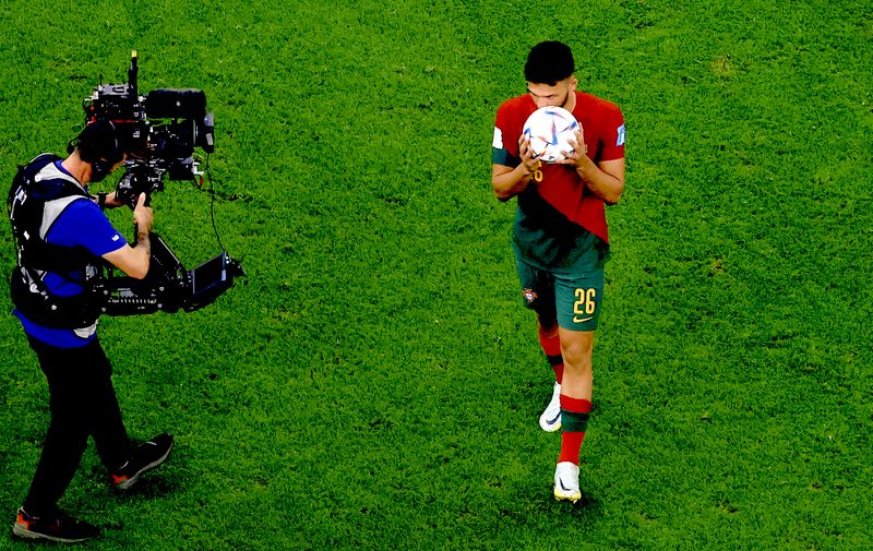 Soccer Football - FIFA World Cup Qatar 2022 - Round of 16 - Portugal v Switzerland - Lusail Stadium, Lusail, Qatar - December 6, 2022
Portugal's Goncalo Ramos celebrates with his hat-trick match ball after the match as Portugal progress to the quarter finals REUTERS/Peter Cziborra