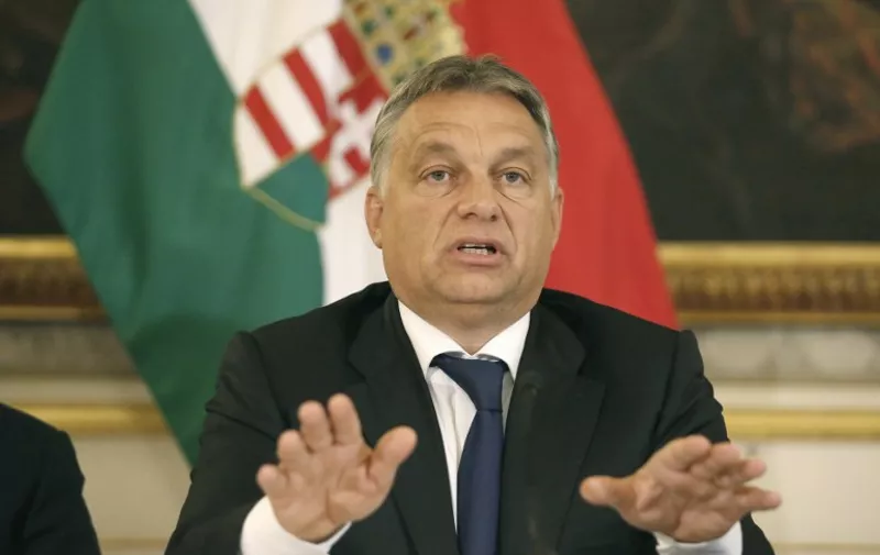 Hungarian  Prime minister Viktor Orban speaks during a press conference at the Hungarian Embassy on September 25, 2015 in Vienna.  Hungary announced Thursday it had started to roll out barbed wire along its border with Slovenia, after it set up similar barriers along its frontiers with Serbia and Croatia to keep refugees out. AFP PHOTO / DIETER NAGL