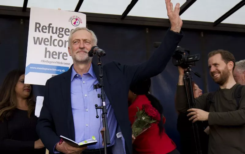 Newly elected leader of Britain's opposition Labour party, Jeremy Corbyn (2L), address a rally pro-refugee rally in central London on September 12, 2015. Anti-austerity leftwinger Jeremy Corbyn was elected leader of Britain's opposition Labour Party in a landslide victory that could divide the party and cause headaches for the government on foreign policy. Tens of thousands of Europeans rallied urging solidarity with the huge numbers of refugees entering the continent, as Hungary's populist premier said leaders were "in a dream world" about the dangers posed by the influx.    AFP PHOTO / JUSTIN TALLIS