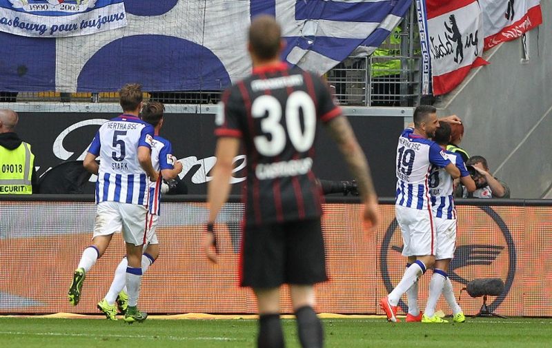 Hertha's  Czech midfielder Vladimir Darida (R) celebrates scoring the 1-1 during the German first division Bundesliga football match Eintracht Frankfurt vs Hertha BSC Berlin in Frankfurt am Main, central Germany, on September 27, 2015. 

RESTRICTIONS: DURING MATCH TIME: DFL RULES TO LIMIT THE ONLINE USAGE TO 15 PICTURES PER MATCH AND FORBID IMAGE SEQUENCES TO SIMULATE VIDEO. 
== RESTRICTED TO EDITORIAL USE ==
FOR FURTHER QUERIES PLEASE CONTACT DFL DIRECTLY AT + 49 69 650050.
