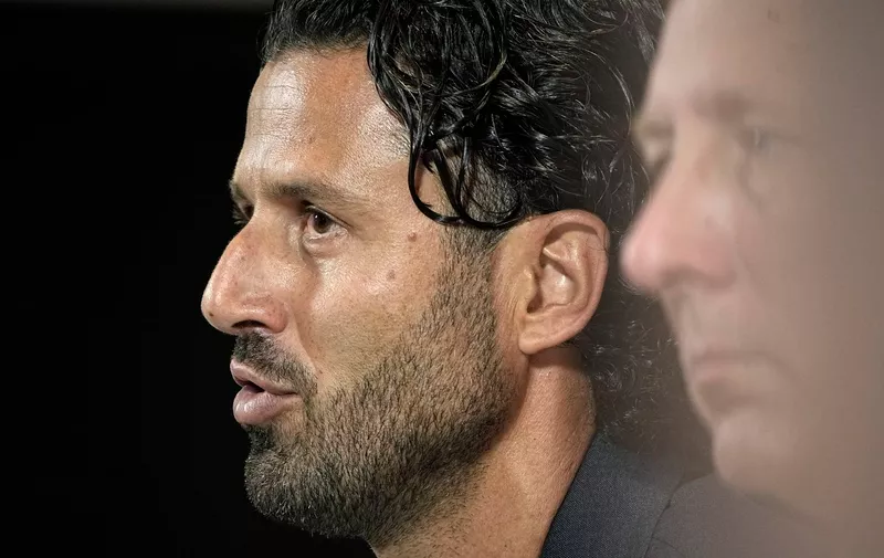 Lyon's Italian new head coach Fabio Grosso answers to journalists during a press conference to announce his arrival, at the Groupama Stadium in Decines, near Lyon, central France, Monday, Sept. 18, 2023. (AP Photo/Laurent Cipriani)