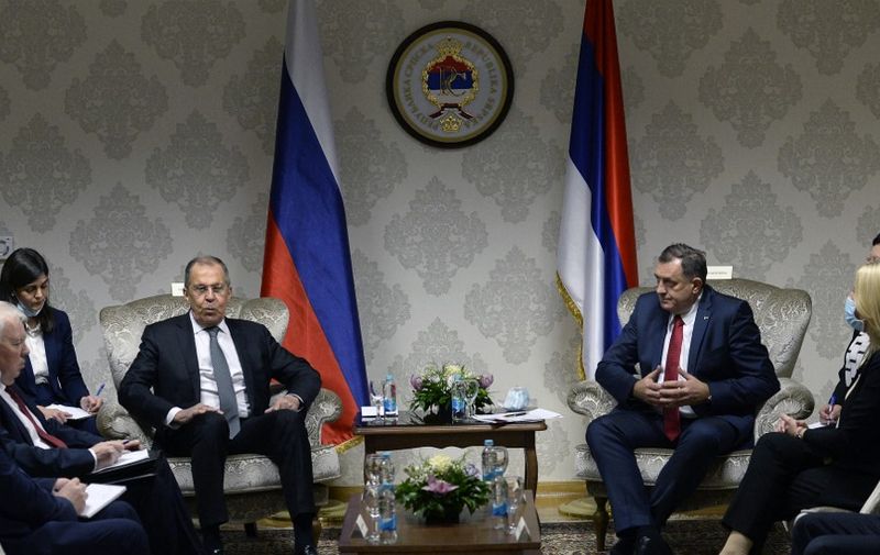 Russian Foreign Minister, Sergey Lavrov (Center L) sits down for a meeting with chairman of Bosnia and Herzegovina's tripartite presidency, Milorad Dodik (Center R), in East-Sarajevo, late on December 14, 2020. - Minister Lavrov arrived in two-day official visit to Bosnia and Herzegovina, where he is scheduled to hold several meetings with country's top officials. (Photo by AFP)
