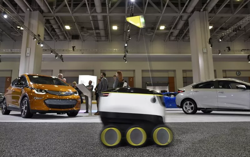 A January 26, 2017 photo shows the Starship Technologies delivery robot at the Washington Auto Show in Washington, DC.
The robots of the future will be coming soon, rolling along at lumbering pace, with those goods you just ordered. The six-wheeled, knee-high robots from startup Starship Technologies are part of a new wave of automated systems taking aim at the "last mile" delivery of goods to consumers.
 / AFP PHOTO / Mandel Ngan / TO GO WITH AFP STORY BY ROB LEVER -"New wave of robots set to deliver the goods"
