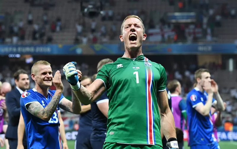 Goalkeeper Hannes Thor Halldorsson of Iceland celebrates the 1-2 victory after the UEFA EURO 2016 Round of 16 soccer match between England and Iceland at Stade de Nice in Nice, France, 27 June 2016. Photo by: Federico Gambarini/picture-alliance/dpa/AP Images