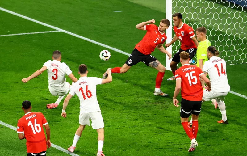 Soccer Football - Euro 2024 - Round of 16 - Austria v Turkey - Leipzig Stadium, Leipzig, Germany - July 2, 2024 Turkey's Merih Demiral scores their first goal REUTERS/Lisi Niesner