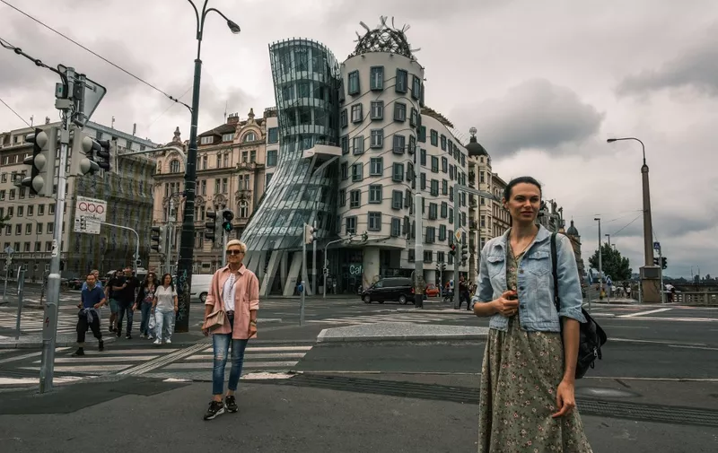 View of The Dancing House is a deconstructivist building from Nationale-Nederlanden, designed by the Croatian-Czech architect Vlado Miluni? in collaboration with Frank Gehry facing the Vltava river. The building was designed in 1992. in Prague, Czech Republic, on  August 5, 2022. (Photo by Oscar Gonzalez/NurPhoto) (Photo by Oscar Gonzalez / NurPhoto / NurPhoto via AFP)