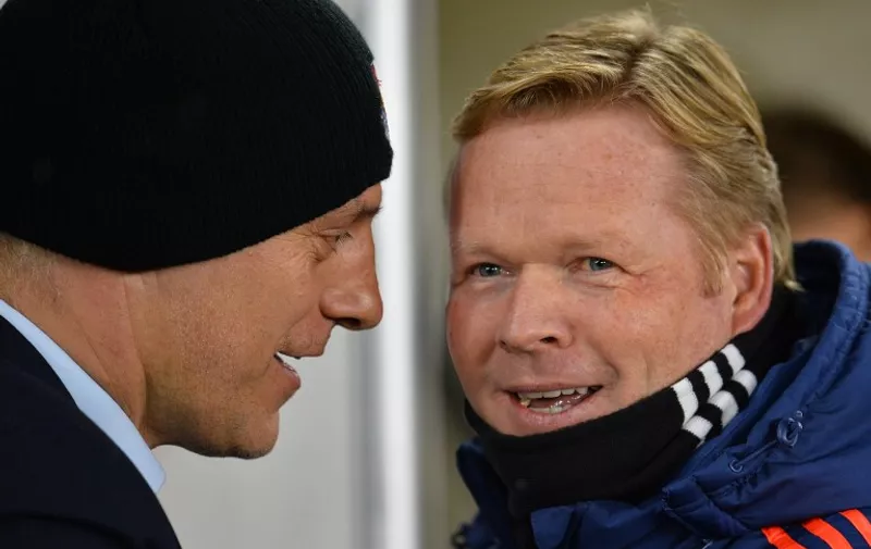 Southampton's Dutch manager Ronald Koeman (R) greets West Ham United's Croatian manager Slaven Bilic during the English Premier League football match between Southampton and West Ham United at St Mary's Stadium in Southampton, southern England on February 6, 2016. / AFP / GLYN KIRK / RESTRICTED TO EDITORIAL USE. No use with unauthorized audio, video, data, fixture lists, club/league logos or 'live' services. Online in-match use limited to 75 images, no video emulation. No use in betting, games or single club/league/player publications.  /