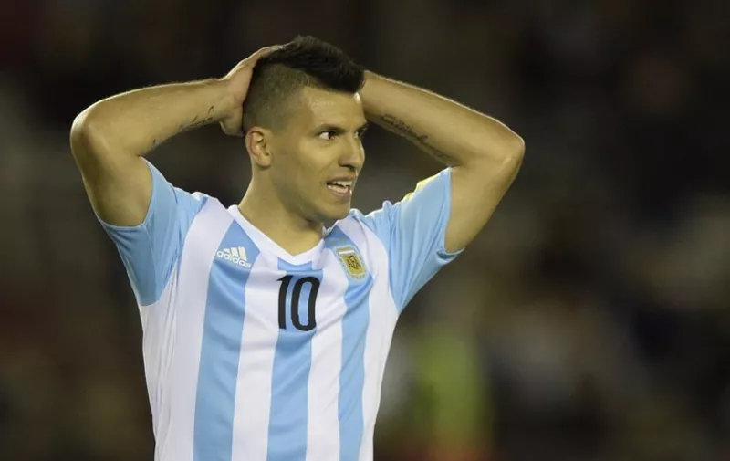 Argentina's forward Sergio Aguero gestures during the Russia 2018 FIFA World Cup qualifiers match against Ecuador, at the Monumental stadium in Buenos Aires, on October 8, 2015.   AFP PHOTO / JUAN MABROMATA