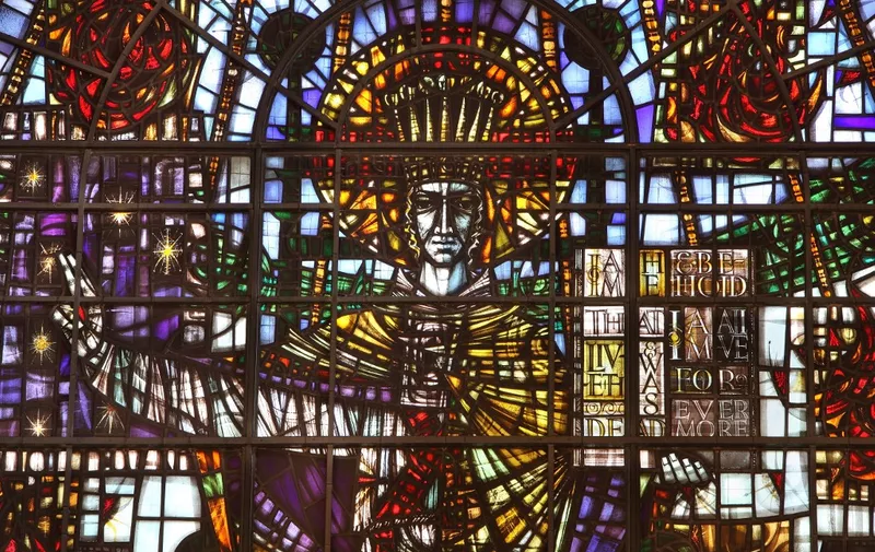 Stained glass window by John Hayward, St Mary-le-Bow Church, Cheapside, City of London, England. This is the East window above the altar in the nave of the church and depicts Christ in Majesty with the 7 gifts of the Holy Spirit. This window dates from 1963 and was part of the restoration of the church after it was damaged in the Blitz of 1941. Sir Christopher Wren rebuilt this church after it was destroyed in the Great Fire of London in 1666. True cockneys are said to be born within the sound of its Bow bells. Picture by Manuel Cohen (Photo by Manuel Cohen / Manuel Cohen / Manuel Cohen via AFP)