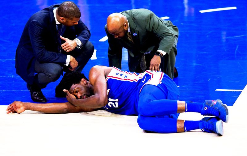 PHILADELPHIA, PA &#8211; MARCH 28: Philadelphia 76ers Center Joel Embiid (21) is attended to for an injury in the first half during the game between the New York Knicks and Philadelphia 76ers on March 28, 2018 at Wells Fargo Center in Philadelphia, PA., Image: 367234201, License: Rights-managed, Restrictions: FOR EDITORIAL USE ONLY. Icon Sportswire (A [&hellip;]