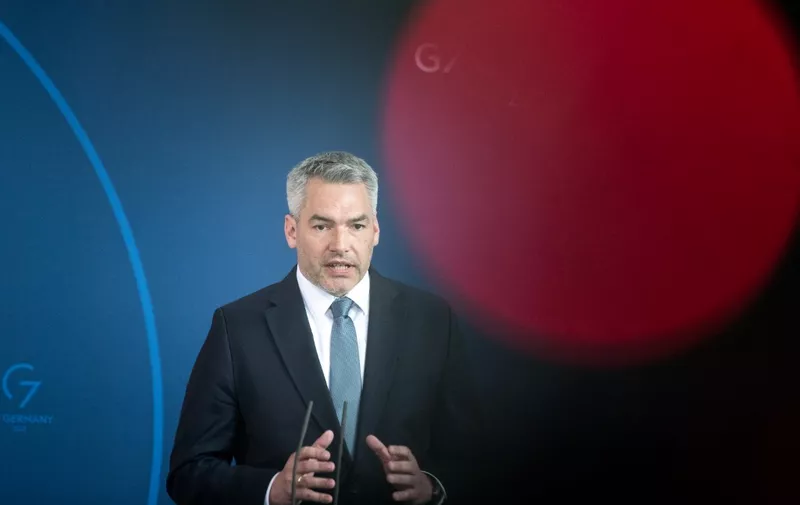 Austrian Chancellor Karl Nehammer addresses a joint press conference with the German Chancellor following bilateral talks at the Chancellery in Berlin on March 31, 2022. (Photo by Stefanie LOOS / POOL / AFP)