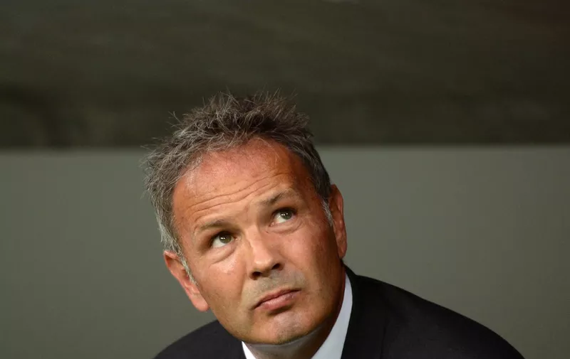 (FILES) In this file photo taken on August 04, 2015 Milan's Serbian head coach Sinisa Mihajlovic waits ahead of the Audi Cup football match FC Bayern Munich vs AC Milan in Munich, southern Germany. - Former Serbia international-turned-coach Sinisa Mihajlovic has died of leukemia at the age of 53, his family said in a statement on December 16, 2022. (Photo by Christof STACHE / AFP)