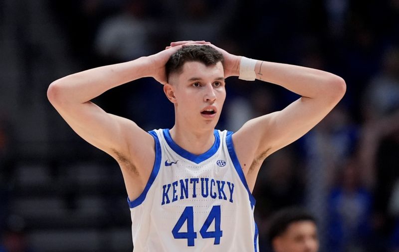 Kentucky forward Zvonimir Ivisic (44) reacts after a foul was called against Kentucky during the first half of an NCAA college basketball game against Texas A&amp;M at the Southeastern Conference tournament Friday, March 15, 2024, in Nashville, Tenn. (AP Photo/John Bazemore)