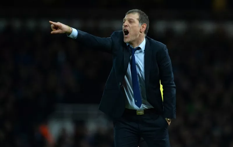 West Ham United's Croatian manager Slaven Bilic gestures during the English FA Cup fourth round replay football match between West Ham United and Liverpool at The Boleyn Ground in Upton Park, east London, on February 9, 2016. / AFP / GLYN KIRK / RESTRICTED TO EDITORIAL USE. No use with unauthorized audio, video, data, fixture lists, club/league logos or 'live' services. Online in-match use limited to 75 images, no video emulation. No use in betting, games or single club/league/player publications.  /