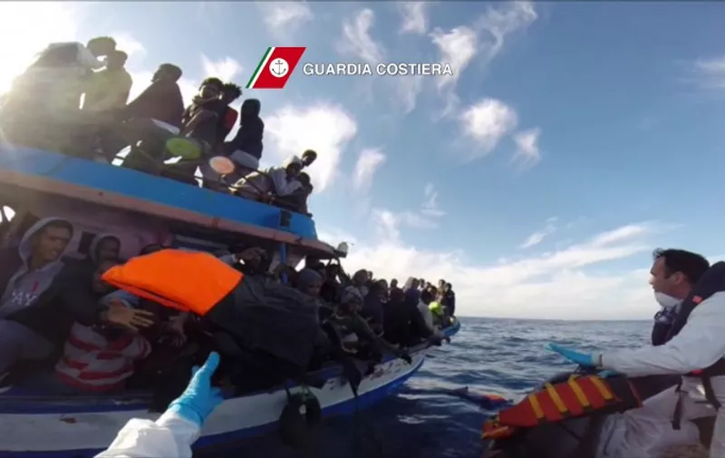 In this video grab released by the Italian Coast Guards (Guardia Costiera) on April 13, 2015 a boat of the Italian Guardia Costiera takes part in a rescue operation of migrants off the coast of Sicily on April 12, 2015. The Italian coastguard said Monday it recovered nine bodies after a boat carrying more than [&hellip;]